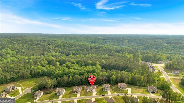 4575 Birch Way, Loganville, GA 30052 - aerial view of property and surrounding area featuring a heavily wooded area