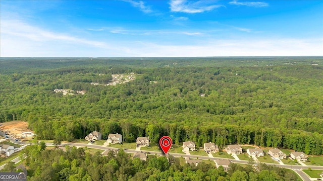 4575 Birch Way, Loganville, GA 30052 - aerial overview of property's location featuring a forest and nearby suburban area
