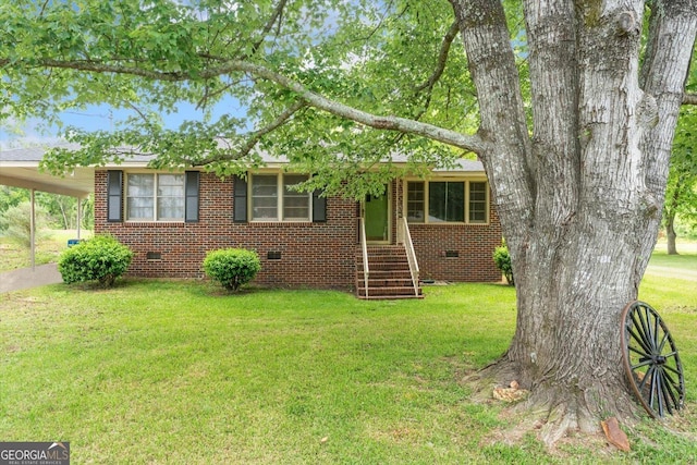 829 Berkshire Dr, Washington, GA 30673 - ranch-style home with brick siding, crawl space, a front yard, and a carport