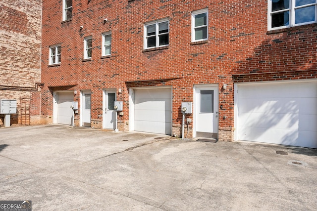 garage featuring driveway