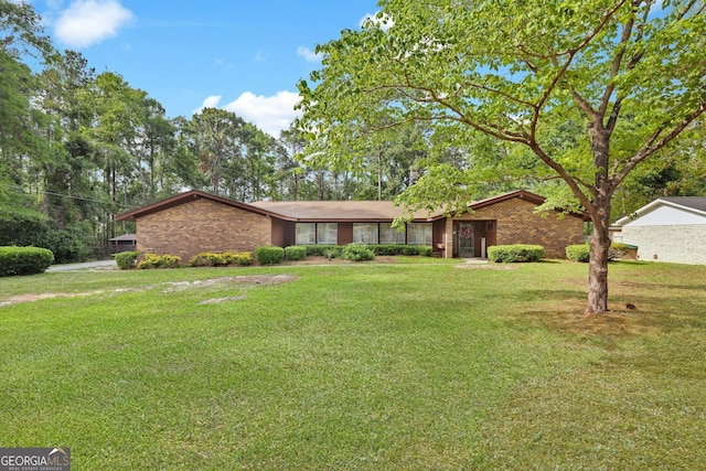 25 Golf Club Cir, Statesboro, GA 30458 - ranch-style house featuring a front lawn and brick siding