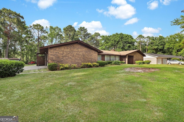 25 Golf Club Cir, Statesboro, GA 30458 - ranch-style house with brick siding, an attached garage, and a front lawn