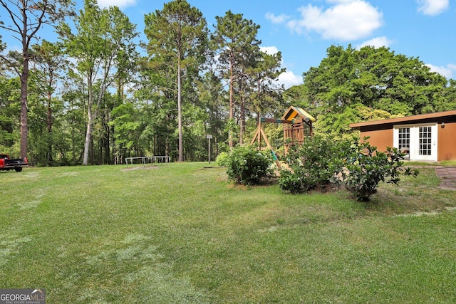 25 Golf Club Cir, Statesboro, GA 30458 - view of yard featuring a playground and french doors