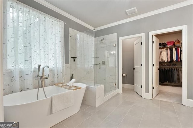 4383 Capstone Ct NE, Roswell, GA 30075 - bathroom with a shower stall, a soaking tub, crown molding, and a spacious closet