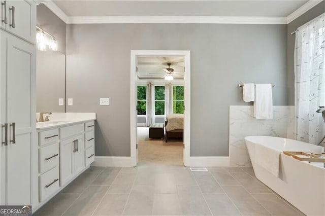 4383 Capstone Ct NE, Roswell, GA 30075 - ensuite bathroom with crown molding, vanity, ceiling fan, a soaking tub, and tile patterned flooring