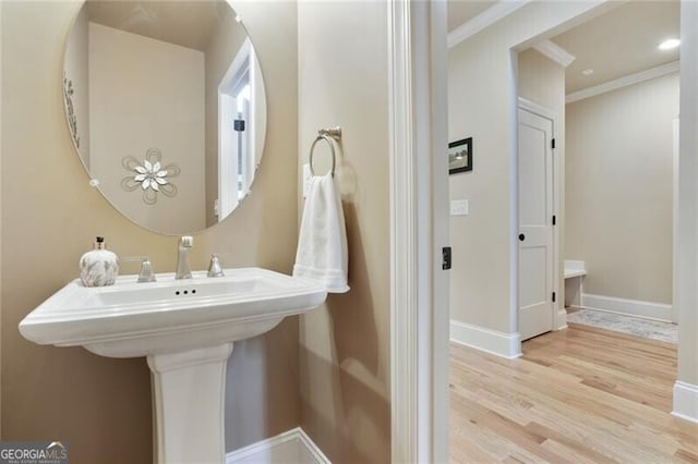 4383 Capstone Ct NE, Roswell, GA 30075 - bathroom with crown molding and wood finished floors