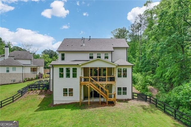 4383 Capstone Ct NE, Roswell, GA 30075 - rear view of house with stairway, a sunroom, and a fenced backyard