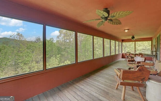 sunroom featuring hardwood / wood-style floors