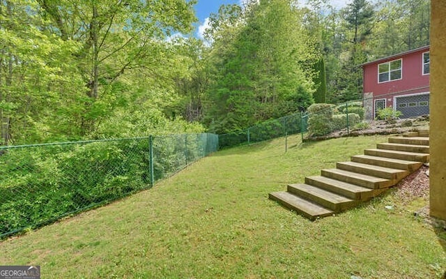 view of yard with fence