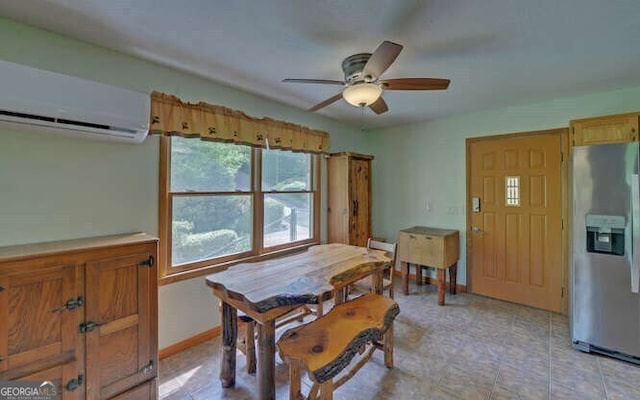 dining room featuring a wall mounted air conditioner, baseboards, and a ceiling fan