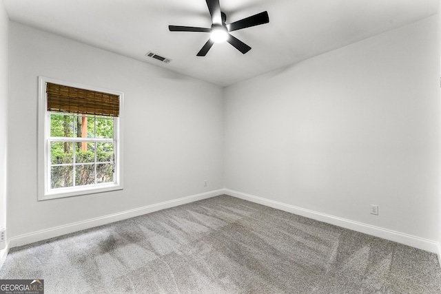3460 Lockmed Dr, Peachtree Corners, GA 30092 - carpeted spare room featuring baseboards and a ceiling fan