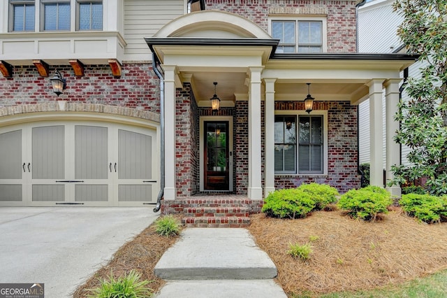 919 Olmsted Ln, Johns Creek, GA 30097 - entrance to property with driveway, brick siding, and covered porch