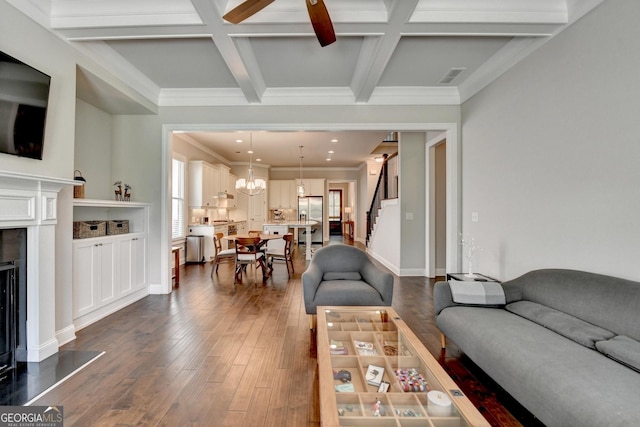 919 Olmsted Ln, Johns Creek, GA 30097 - living area featuring stairs, beamed ceiling, dark wood finished floors, and plenty of natural light