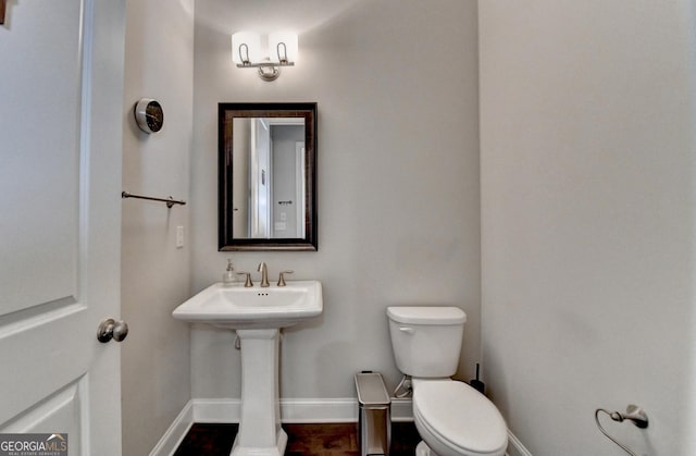 919 Olmsted Ln, Johns Creek, GA 30097 - half bathroom with toilet and baseboards