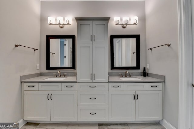 919 Olmsted Ln, Johns Creek, GA 30097 - bathroom with double vanity, baseboards, and a sink