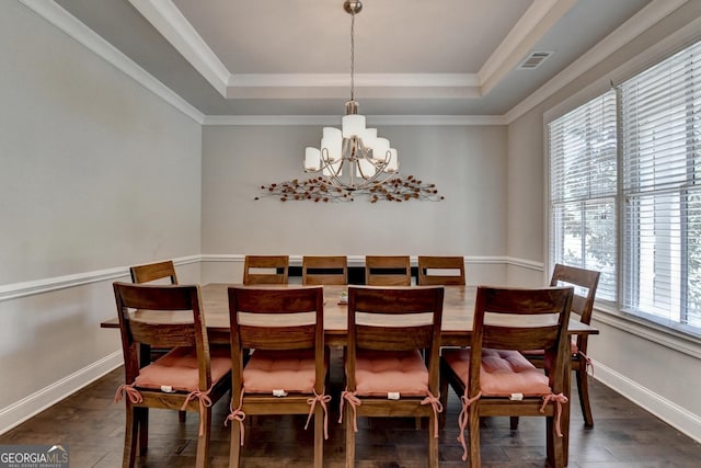 919 Olmsted Ln, Johns Creek, GA 30097 - dining room featuring a notable chandelier, a tray ceiling, baseboards, dark wood-style flooring, and crown molding