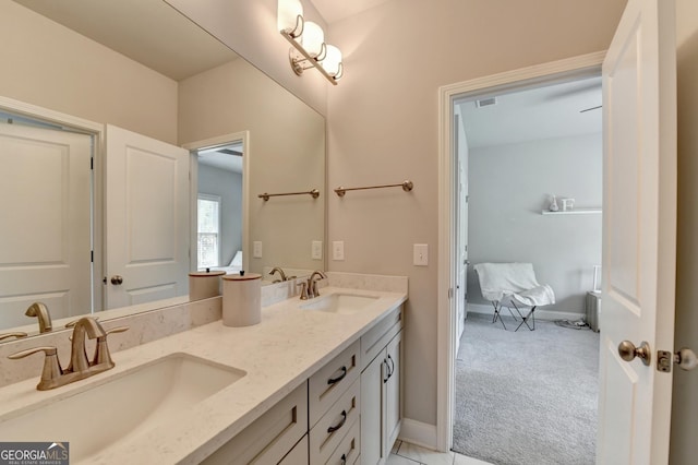 919 Olmsted Ln, Johns Creek, GA 30097 - full bath with a sink, double vanity, baseboards, and visible vents
