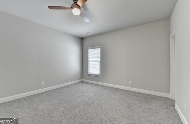 919 Olmsted Ln, Johns Creek, GA 30097 - carpeted spare room with baseboards, a ceiling fan, and visible vents