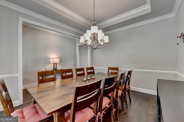 919 Olmsted Ln, Johns Creek, GA 30097 - dining space featuring ornamental molding, dark wood-style flooring, a notable chandelier, and a tray ceiling