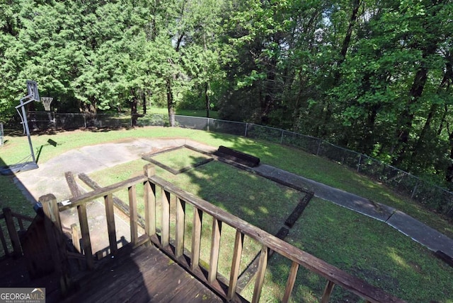 view of yard featuring a wooden deck and a fenced backyard