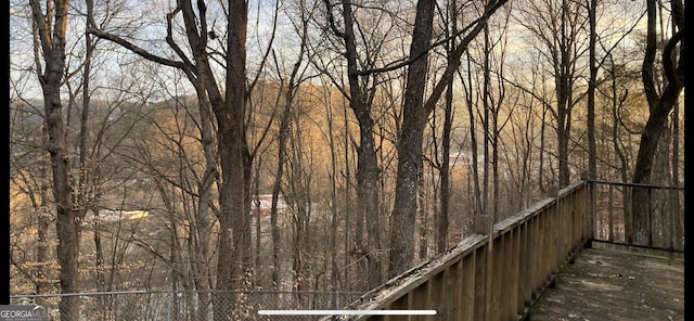 exterior space featuring a view of trees