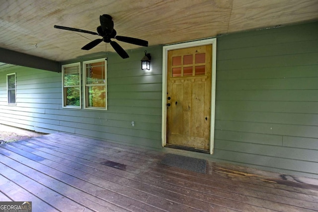 wooden deck with ceiling fan