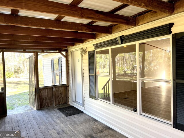 104 Scattered Pines Rd, Hortense, GA 31543 - unfurnished sunroom with beamed ceiling