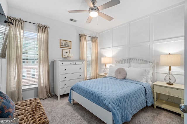 1098 Caruso Dr, Buford, GA 30518 - bedroom featuring a decorative wall, carpet floors, and ceiling fan