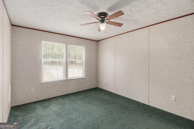 unfurnished room featuring ceiling fan, a textured ceiling, ornamental molding, and carpet floors