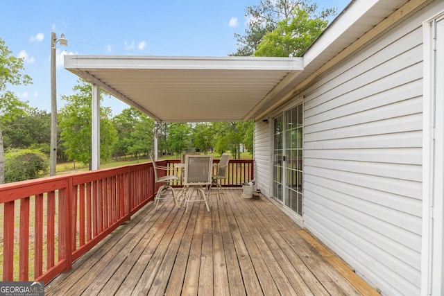 deck featuring outdoor dining space