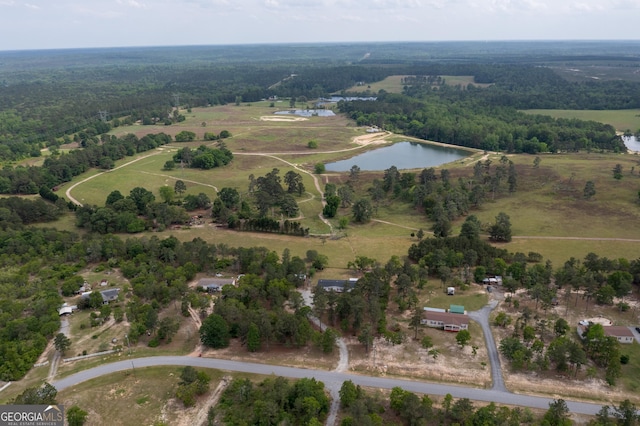 aerial view with a water view and a rural view