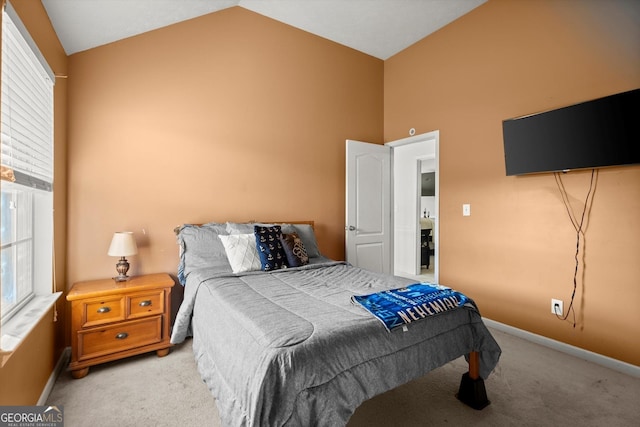 bedroom with baseboards, multiple windows, and carpet