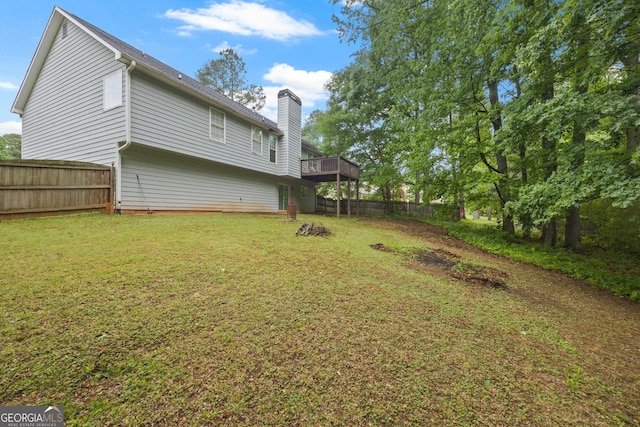 173 Kingswood Dr, Ellenwood, GA 30294 - view of yard with a wooden deck and a fenced backyard