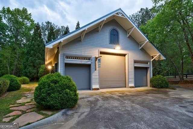 4500 Candacraig, Alpharetta, GA 30022 - view of front of house with an outdoor structure and a garage