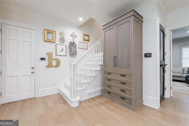 4500 Candacraig, Alpharetta, GA 30022 - entrance foyer with baseboards, stairway, crown molding, and light wood-style floors