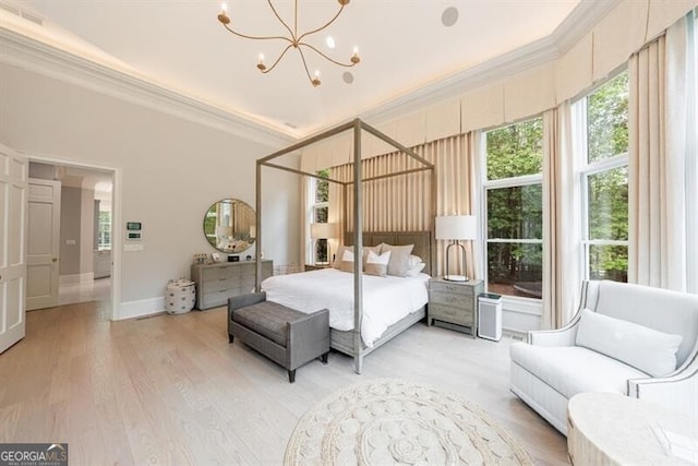 4500 Candacraig, Alpharetta, GA 30022 - bedroom with a notable chandelier, light wood-type flooring, visible vents, baseboards, and ornamental molding
