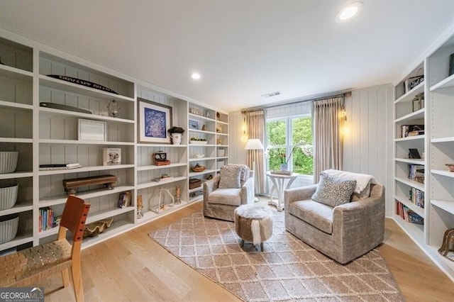 4500 Candacraig, Alpharetta, GA 30022 - living area with built in features, visible vents, and wood finished floors
