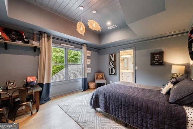 4500 Candacraig, Alpharetta, GA 30022 - bedroom with a tray ceiling, wooden ceiling, ensuite bath, visible vents, and wood finished floors