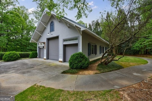 4500 Candacraig, Alpharetta, GA 30022 - view of home's exterior featuring driveway and a garage