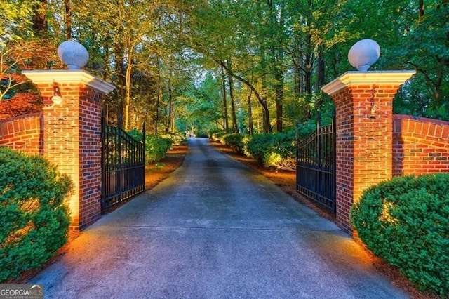 4500 Candacraig, Alpharetta, GA 30022 - view of road with a gate, a gated entry, and driveway