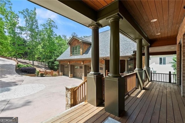 4290 Bobbins Way, Cumming, GA 30041 - deck featuring a garage and driveway