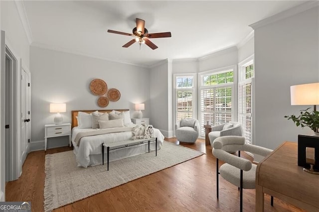 4290 Bobbins Way, Cumming, GA 30041 - bedroom featuring crown molding, wood finished floors, baseboards, and ceiling fan