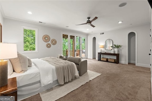 4290 Bobbins Way, Cumming, GA 30041 - carpeted bedroom featuring arched walkways, access to exterior, recessed lighting, crown molding, and baseboards