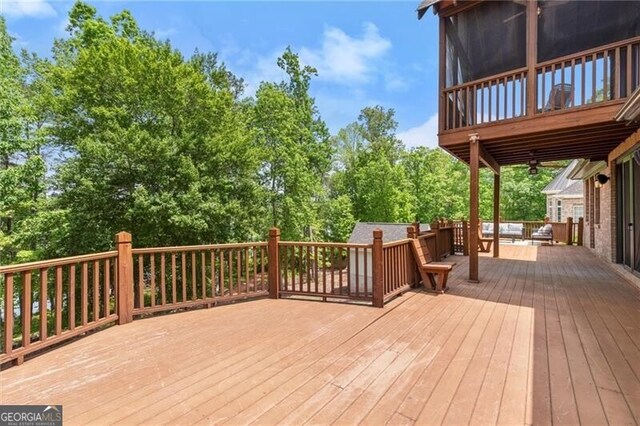 4290 Bobbins Way, Cumming, GA 30041 - wooden terrace featuring view of wooded area
