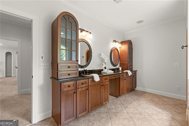 4290 Bobbins Way, Cumming, GA 30041 - bathroom with crown molding, baseboards, and double vanity