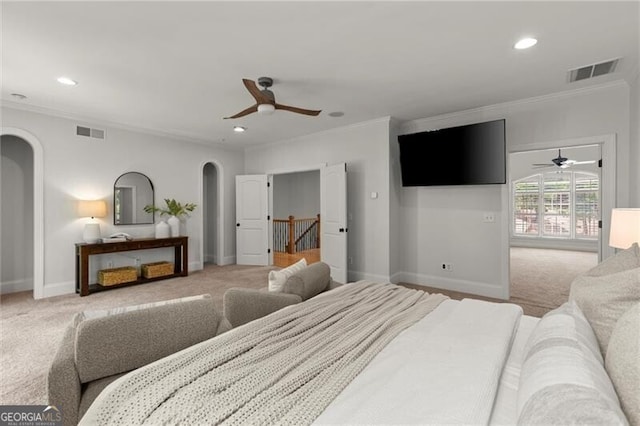4290 Bobbins Way, Cumming, GA 30041 - bedroom featuring arched walkways, crown molding, light colored carpet, recessed lighting, and ceiling fan