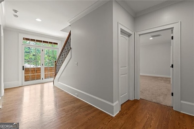 4290 Bobbins Way, Cumming, GA 30041 - stairs featuring wood finished floors, baseboards, ornamental molding, and recessed lighting