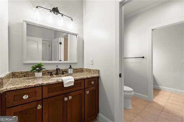 4290 Bobbins Way, Cumming, GA 30041 - bathroom with crown molding, toilet, vanity, tile patterned floors, and baseboards