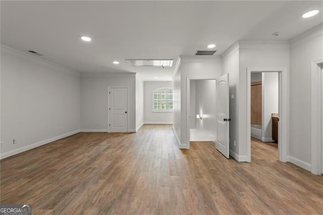 4290 Bobbins Way, Cumming, GA 30041 - empty room featuring attic access, crown molding, wood finished floors, baseboards, and recessed lighting
