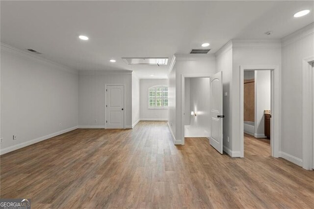 4290 Bobbins Way, Cumming, GA 30041 - unfurnished bedroom featuring attic access, crown molding, wood finished floors, and recessed lighting